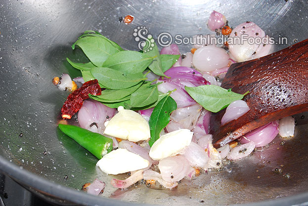 Add garlic, green chilli, dry red chilli, curry leaves saute