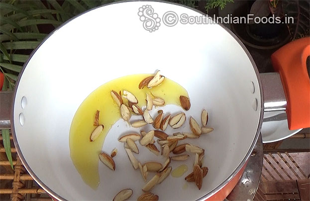 Heat pan add ghee & almonds