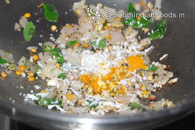 Add coconut, turmeric powder & salt mix well