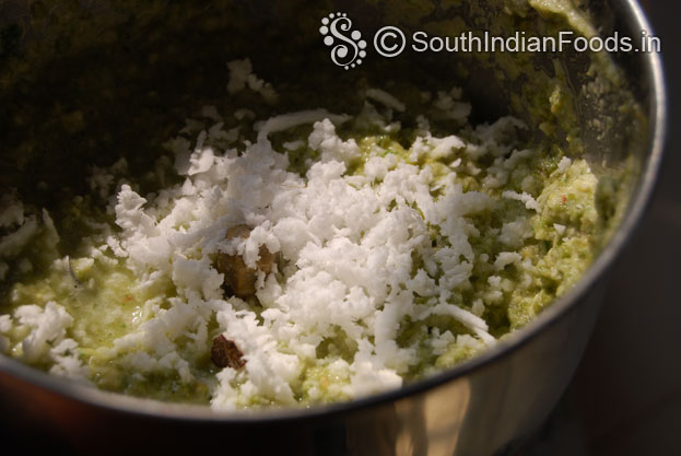 Add grated coconut mix well