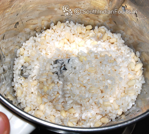 In a mixie jar add saoked rice & urad dal, coarsely grind