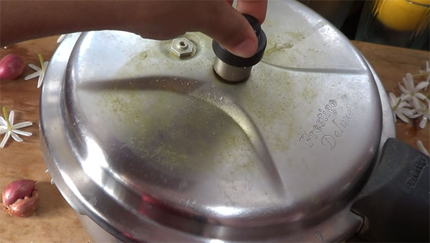 Cover lid, cook for 2 whistles