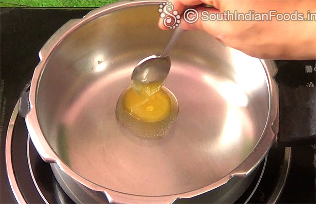 Heat pressure cooker, add butter
