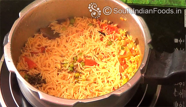Delicious perfect textured tomato biryani ready, serve hot with raita