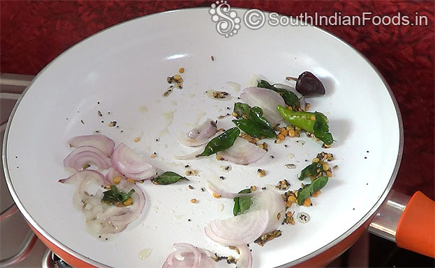 Add onion, curry leaves, dry red chilli & green chilli