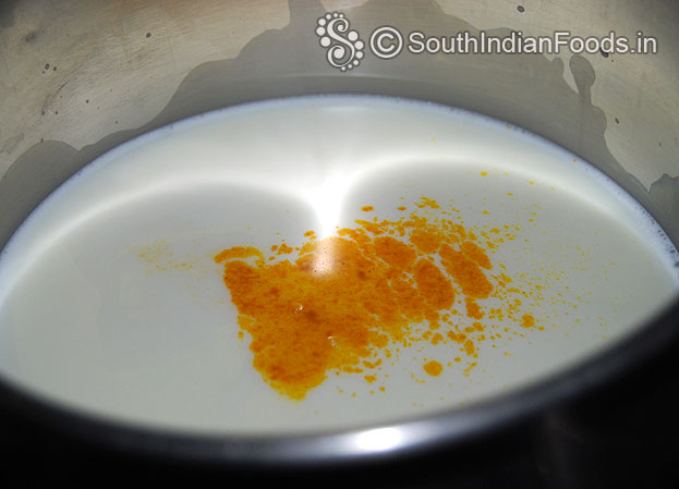 Boil milk add turmeric powder
