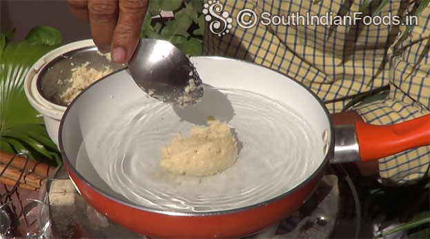 Add ground urad dal, mix well without lumps