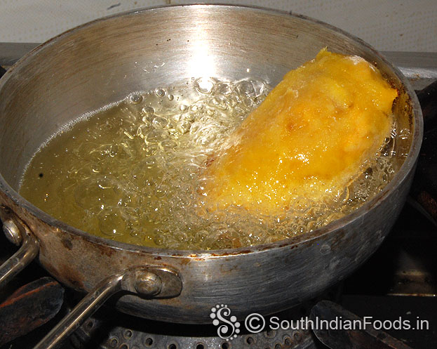 Heat oil, drop stuffed banana