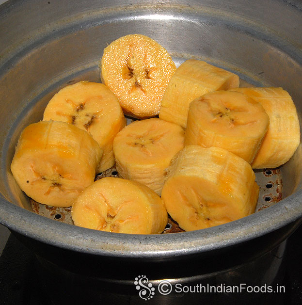 Take 1 nendran banana, peel off, slice, then steam it for 5 min