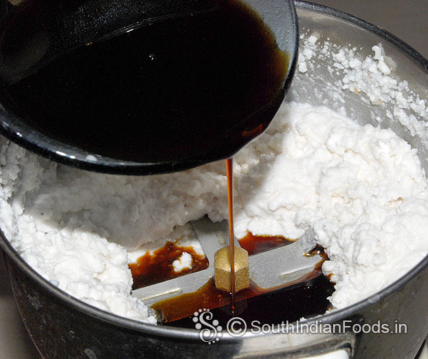 Add jaggery syrup, grind to fine batter