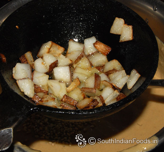 Add roasted coconut pieces