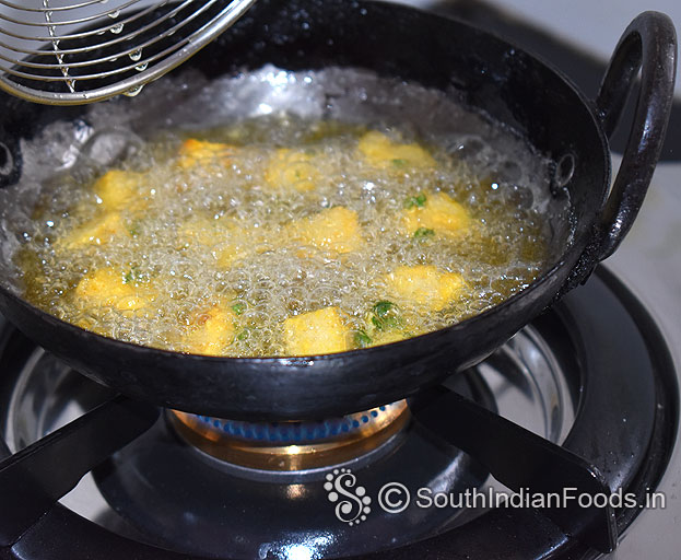 Heat oil in a pan, drop idli cubes