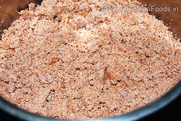 Add warm water and make puttu base