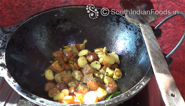Add turmeric, red chilli powder, asafoetida, jackfruit seed, salt & garam masala saute