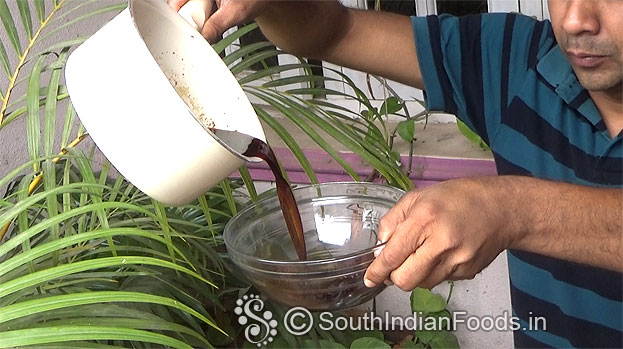 Transfer jaggery syrup to a bowl