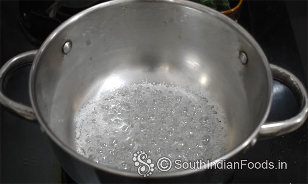 In a bowl add curd, cardamom, sugar