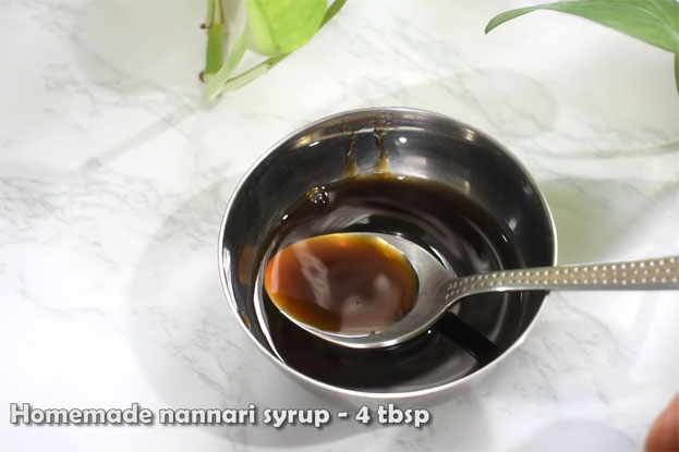 In a bowl add curd, cardamom, sugar