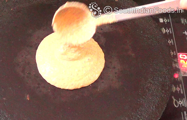 Heat iron dosa tawa, pour batter