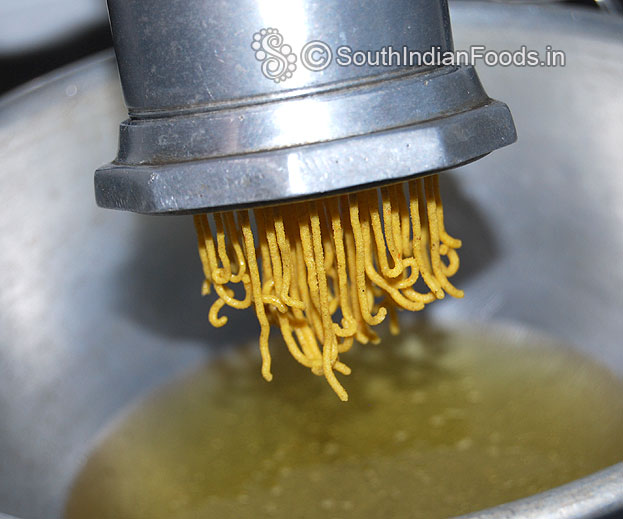 Heat oil in a pan, squeeze over the oil & deep fry till crisp