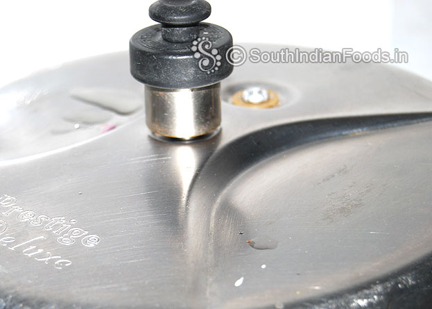Cover it & cook for 4 to 5 whistles