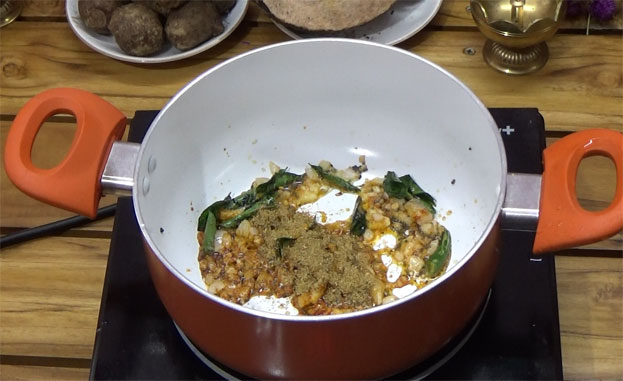 Add turmeric powder, coriander powder