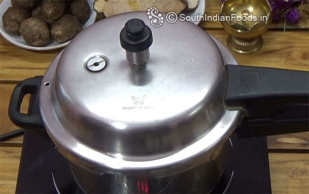 Cover lid, cook for 1 whistles
