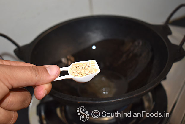 Heat pan add mustard, & urad dal