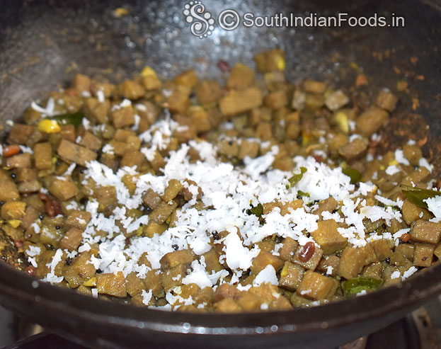 Add grated coconut, cut off heat