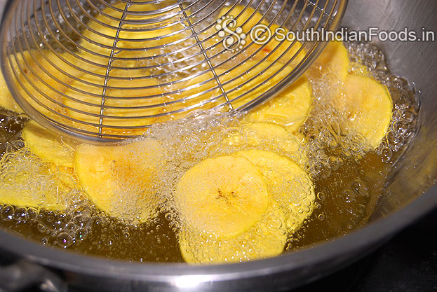 Heat coconut oil in a pan add thinly sliced banana pieces