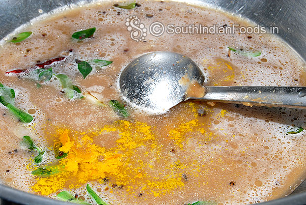 Add horse gram paste, water and turmeric powder