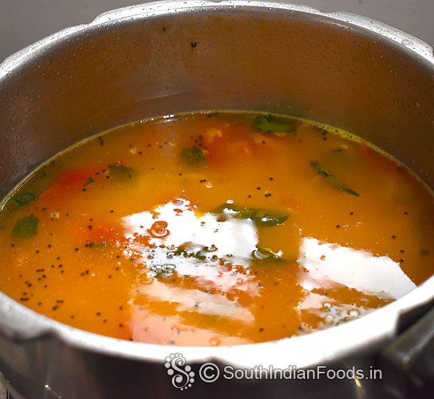 Let it boil, cover lid & cook for 3 to 4 whistles