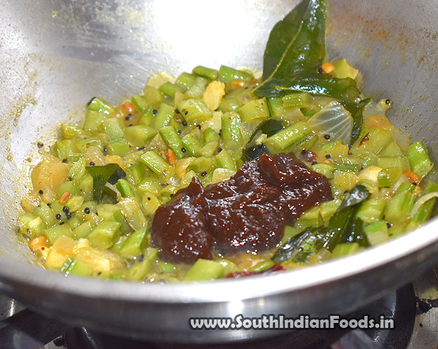 Add tamarind paste mix well.