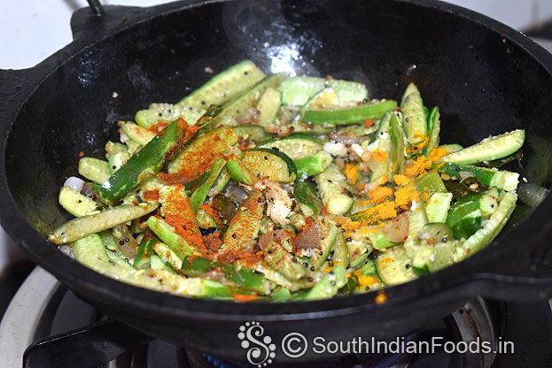 Add red chilli powder and turmeric powder