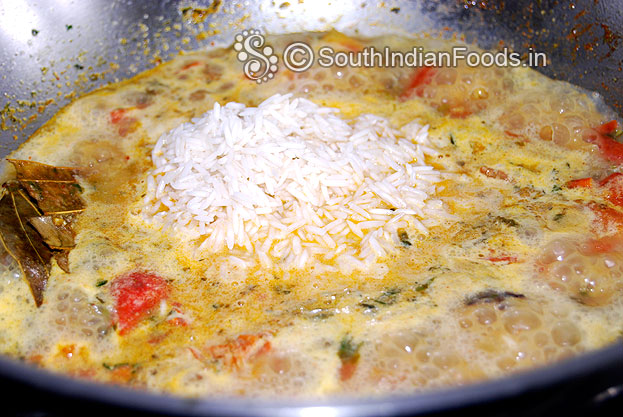Add soaked rice mix well