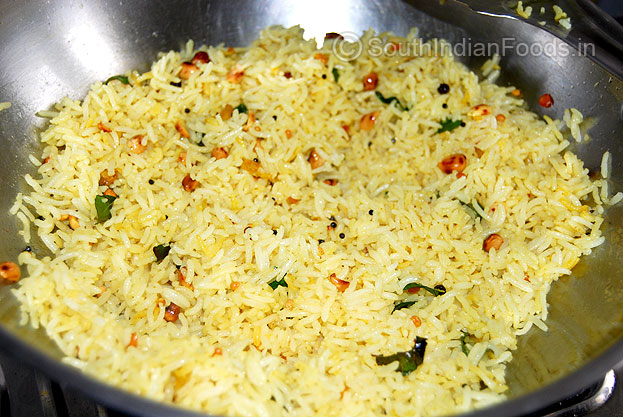 Add boiled rice and sprinkle salt mix well