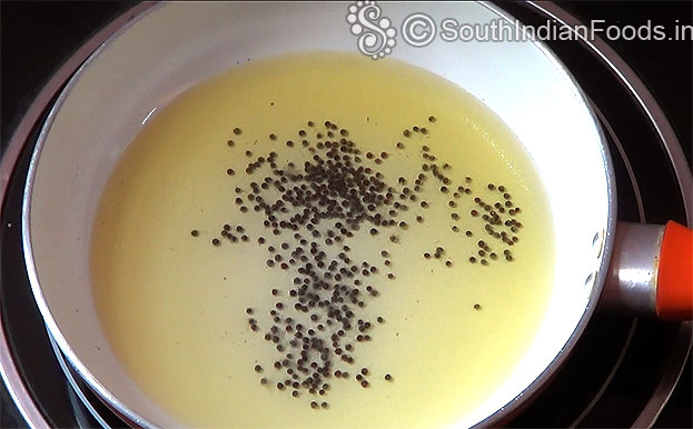 Heat sesame oil, add mustard, let it splutter