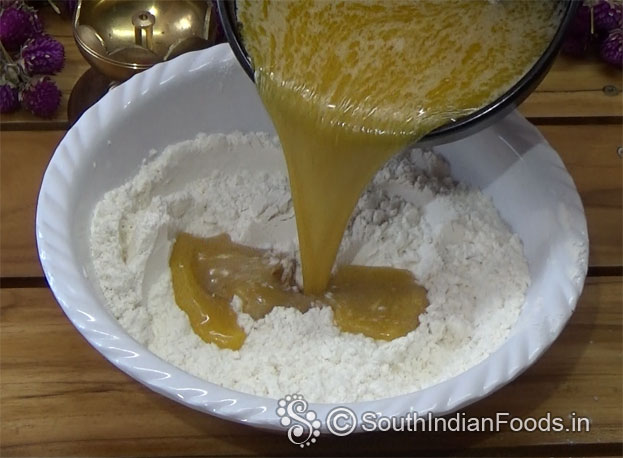 Grease tray with butter then sprinkle flour coat well