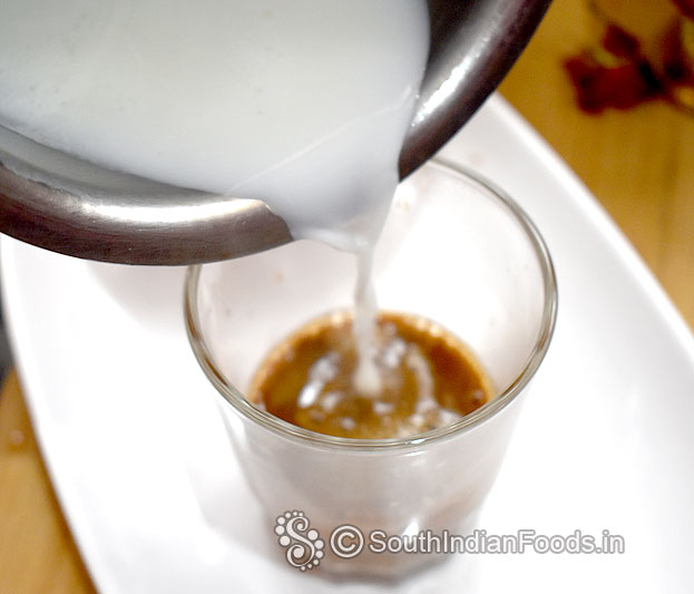 Add boiled powder milk, stir till frothy