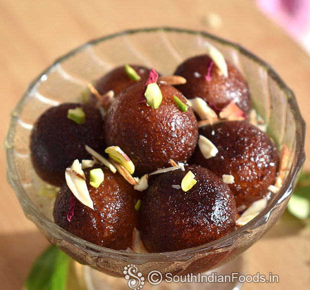 After 30 min, sprinkle almonds, pista &dried rose petals, serve it cool