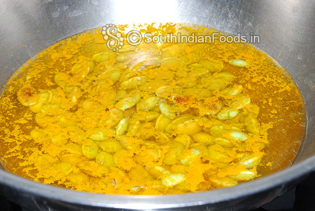 Boil lima beans with turmeric, salt added water till soft.