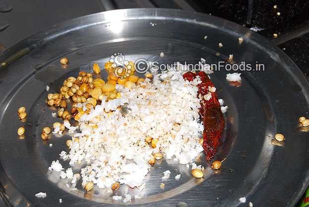 Heat oil in a pan roast coconut, dry red chilli, coriander, bengal gram & urad dal then finely grind with 1/4 cup of water