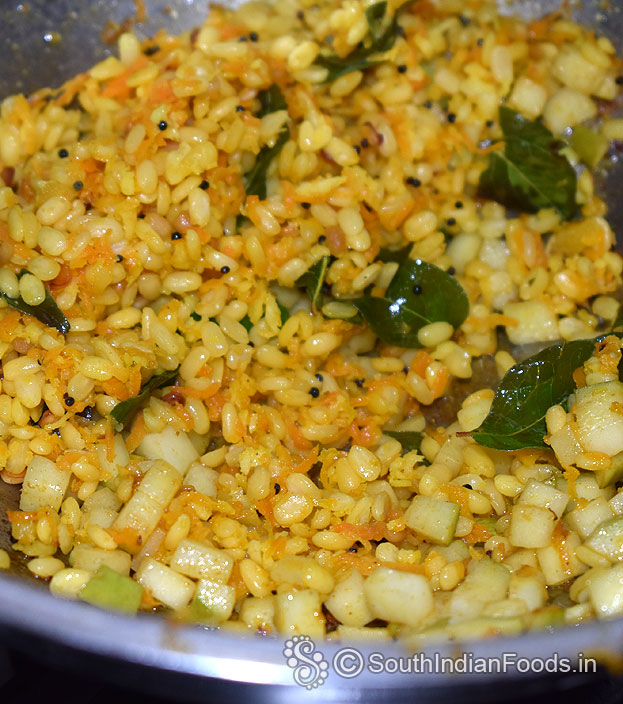 Add sauted mango, mix well
