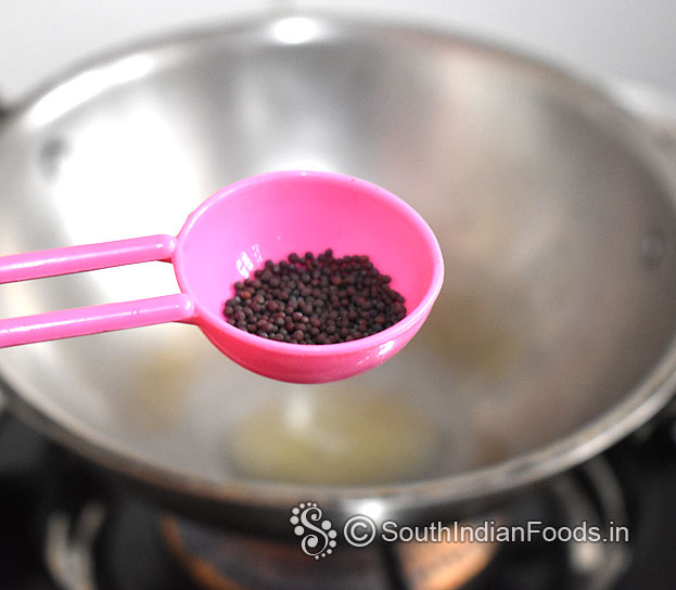 Heat oil, add mustard seeds 