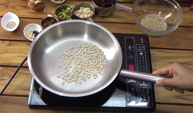 Add melon seeds, roast