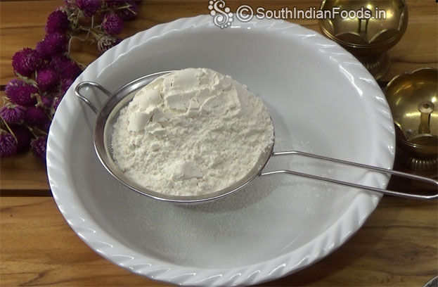 In a mixer jar add flour 