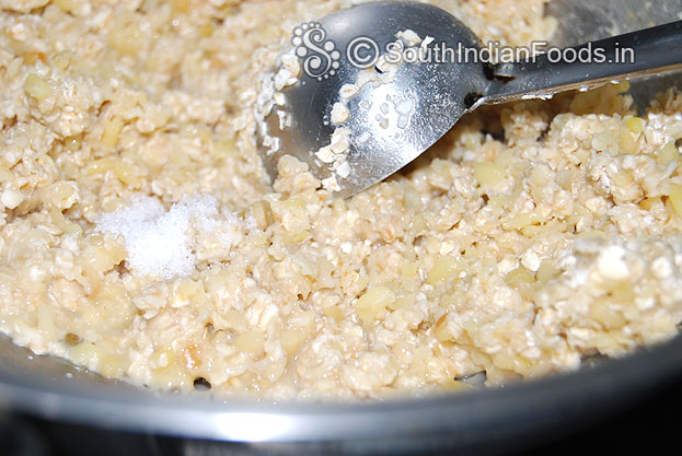 Then add oats and salt mix well in low flame then cover lid cook for a min.