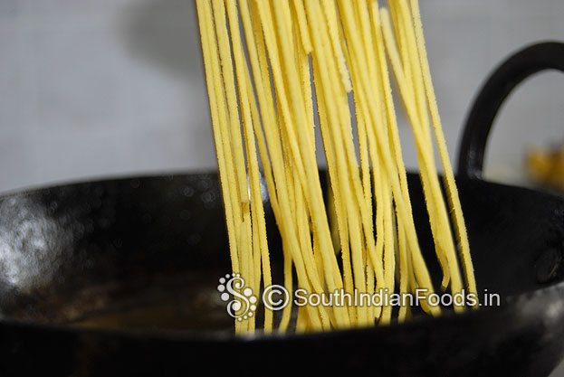 Heat oil in a pan then press gently