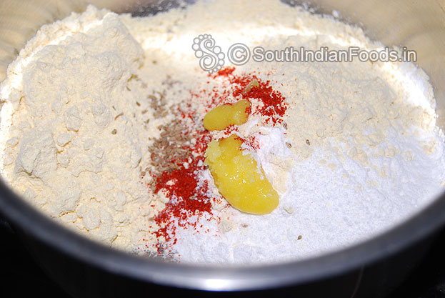 Add ghee, salt, warm water mix well, knead it & make soft dough