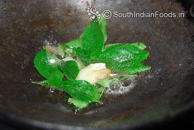 Heat gingelly oil in a pan, add curry leaves, asafetida & garlic fry in low flame