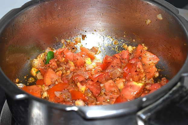 Add tomato saute till soft